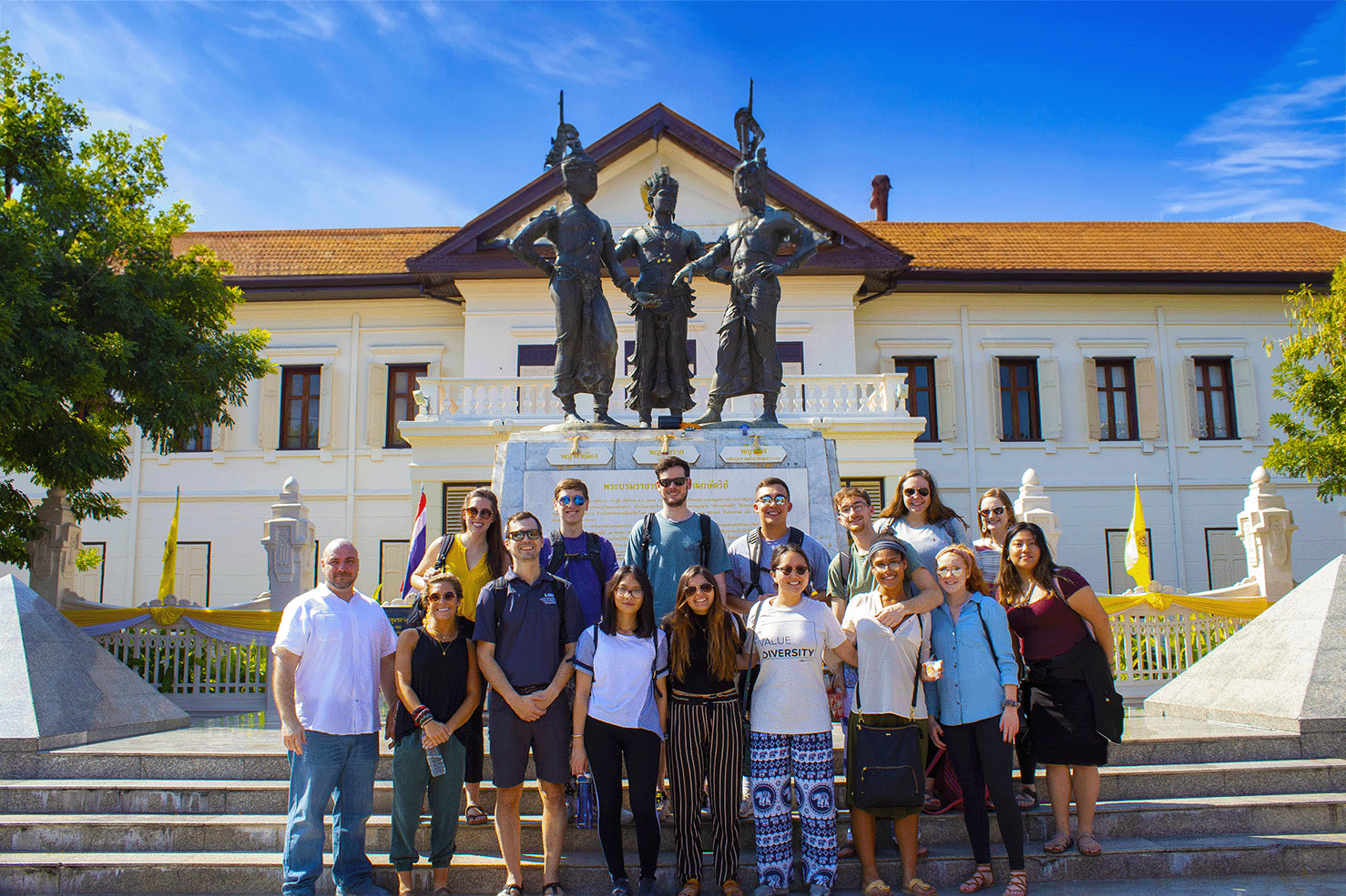 students standing infront of Chiand Mai, Thailand city hall