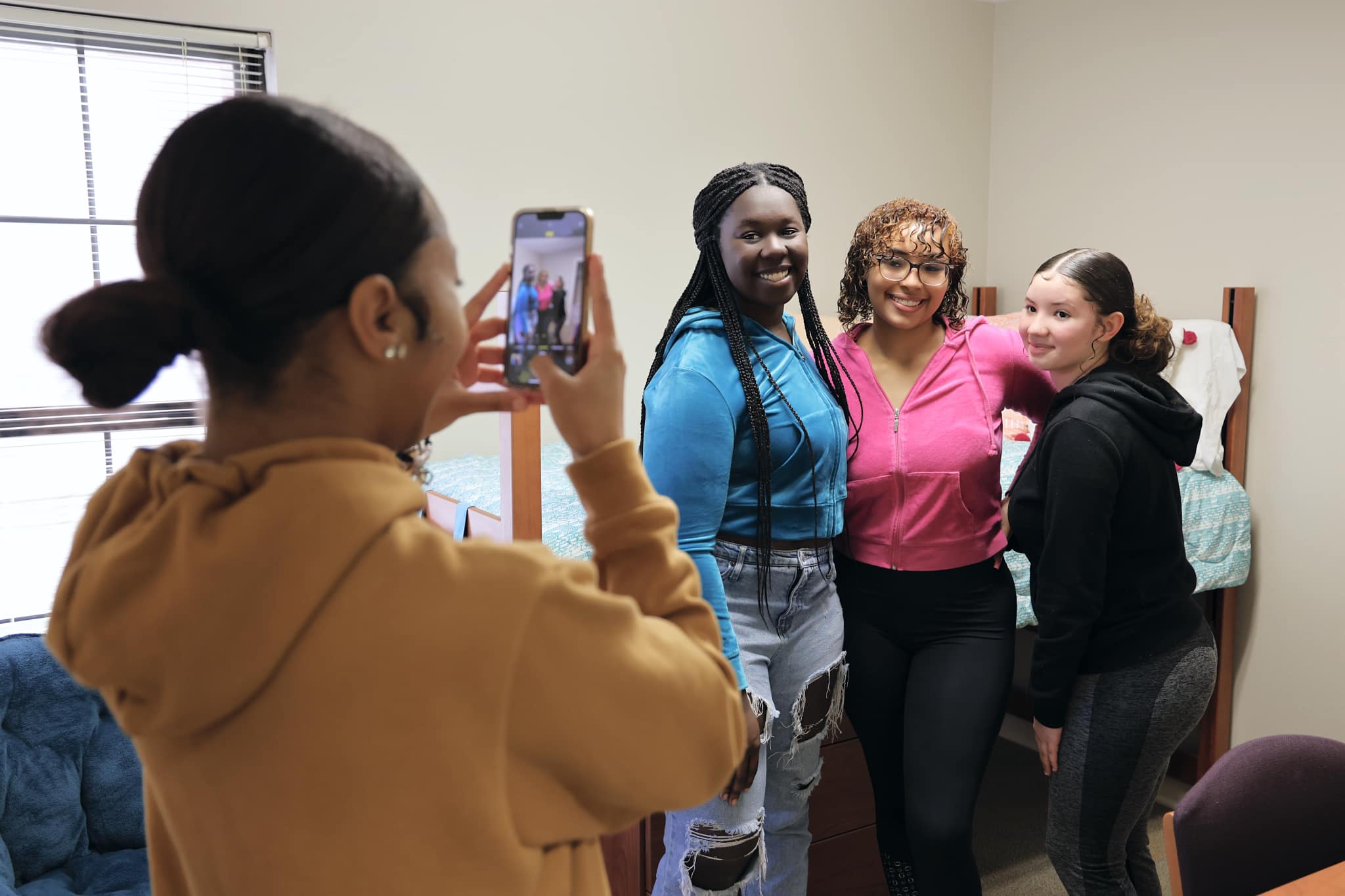 three students posing for a photo